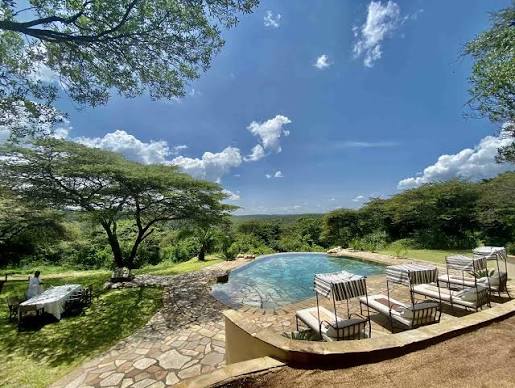 A Maasai guide in the East African landscape